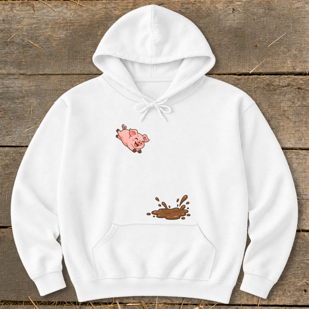 White hoodie with a cartoon pig jumping near a mud splatter.