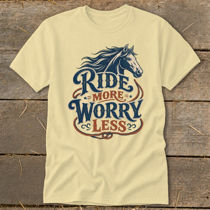 Pale yellow t-shirt with vintage style "Ride More Worry Less" text and horse graphic.