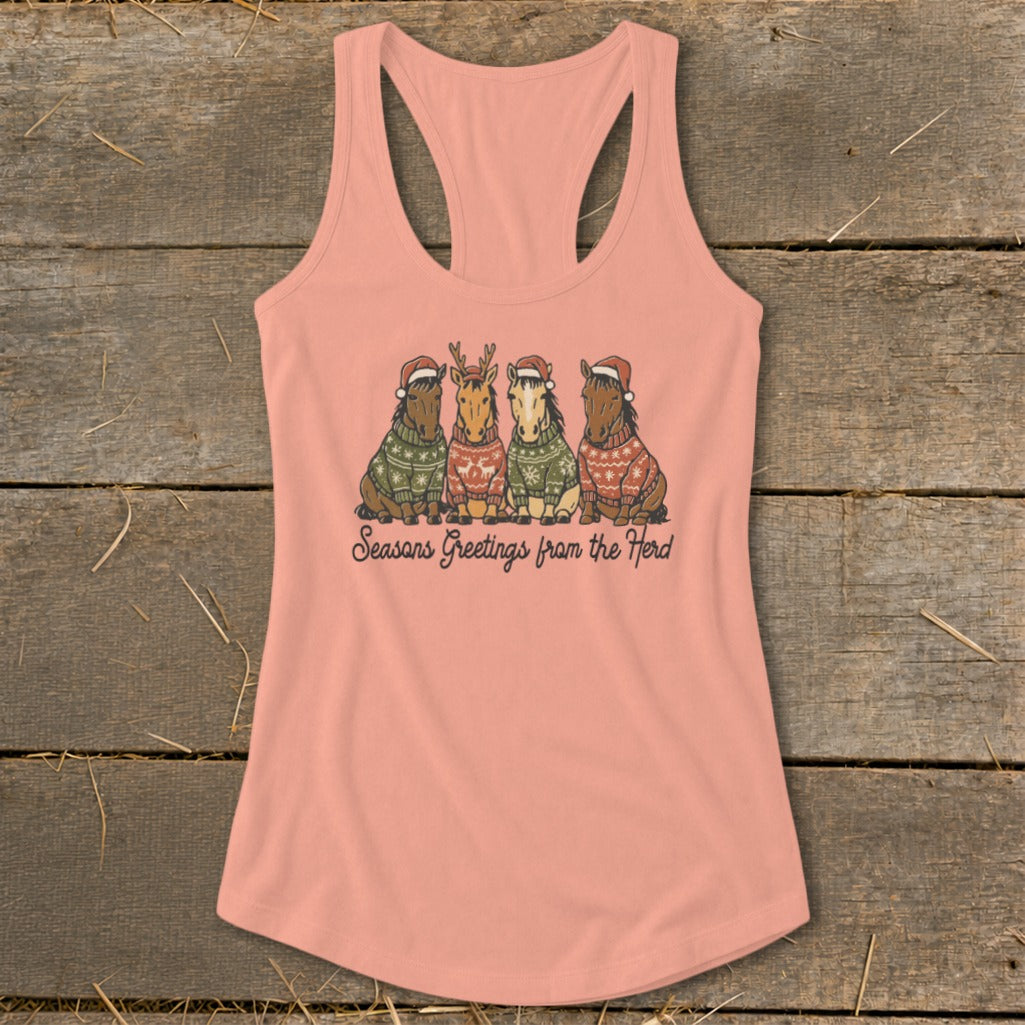 Peach tank top with four horses in sweaters and Santa hats.