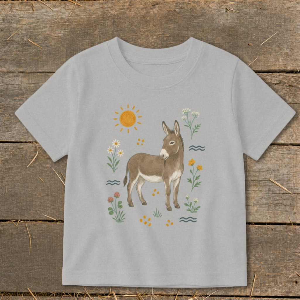 Gray t-shirt with illustration of a donkey surrounded by flowers and a sun.