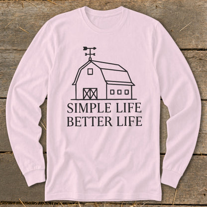 Long sleeve pink t-shirt with black barn graphic and "Simple Life Better Life" text.