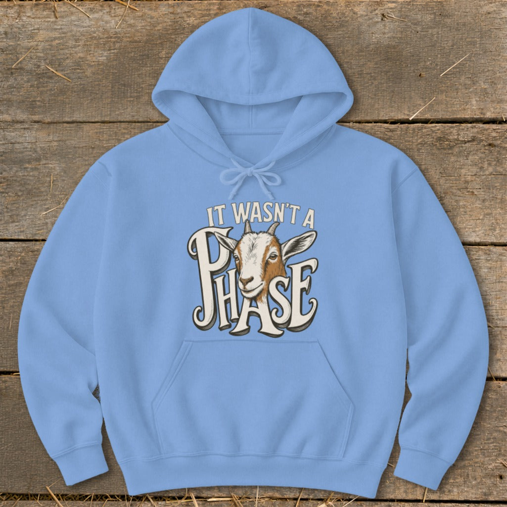 Light blue hoodie with a goat and text that reads "IT WASN'T A PHASE."