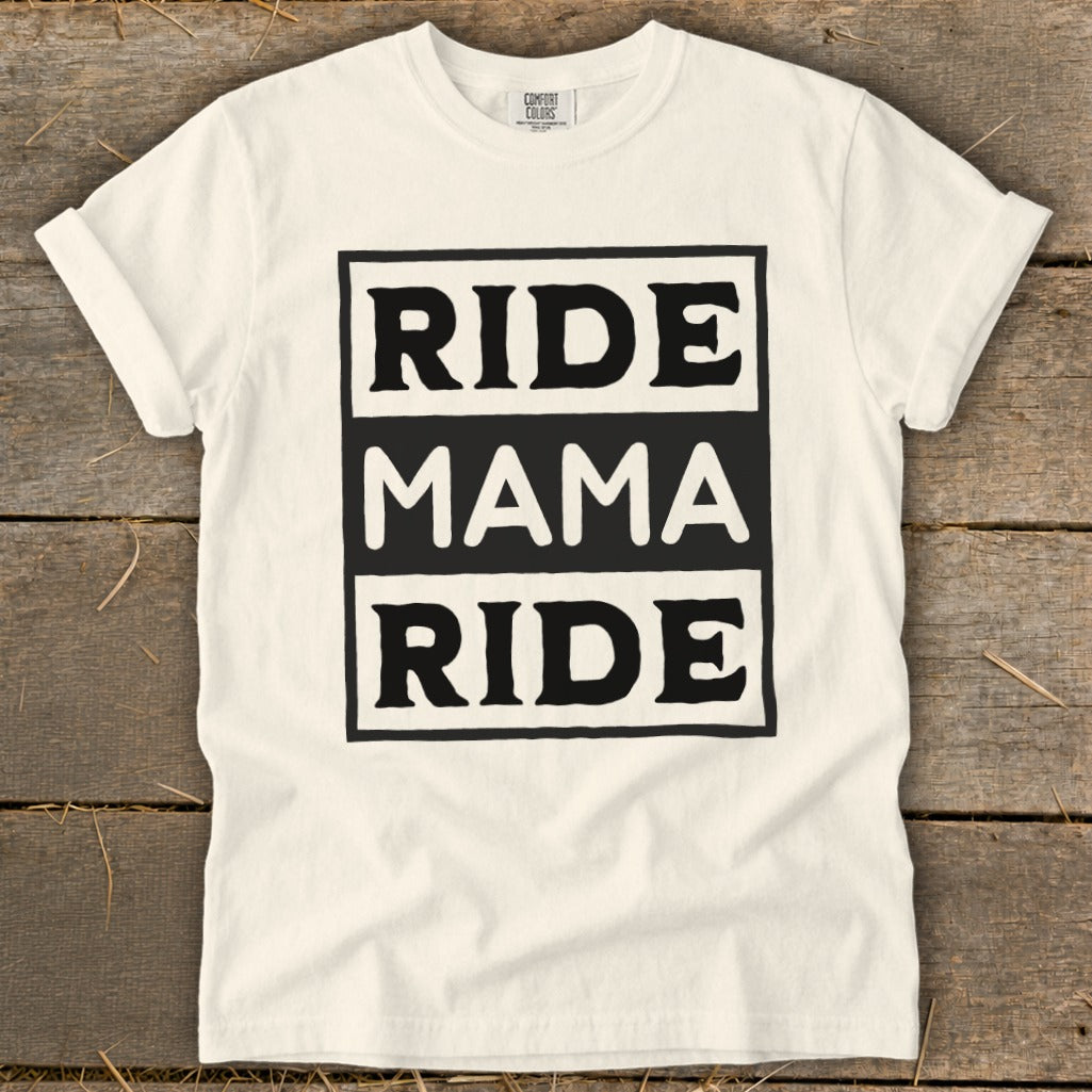 Cream t-shirt with black text reading "RIDE MAMA RIDE" in a central box.