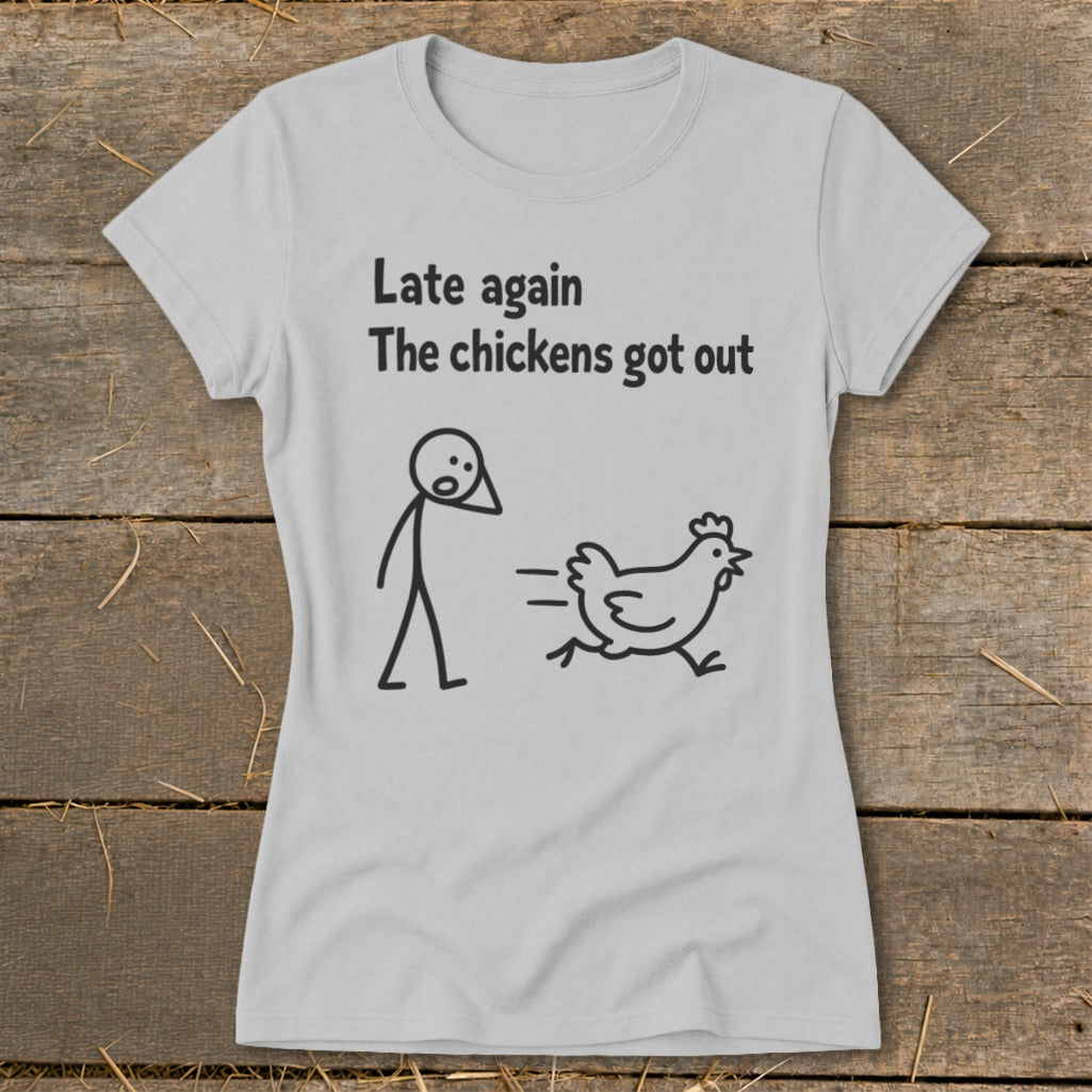 Light grey t-shirt with "Late again The chickens got out" text and stick figures.
