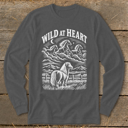 Long sleeve shirt with "Wild at Heart" text and a graphic of horses and mountains.