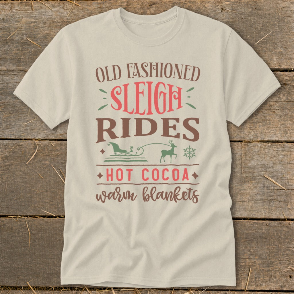 Cream t-shirt with "Old Fashioned Sleigh Rides Hot Cocoa Warm Blankets" text and graphics.