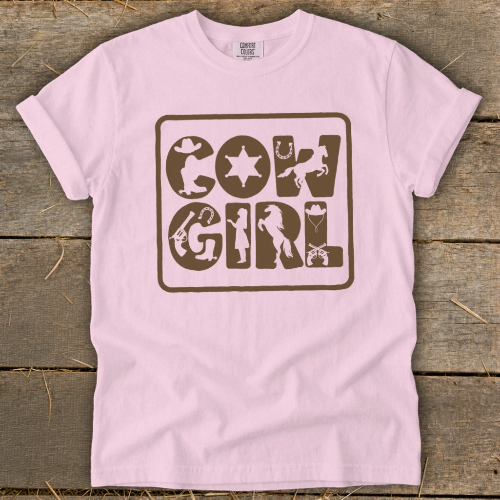 Pink t-shirt with brown "COW GIRL" text and western-themed icons.