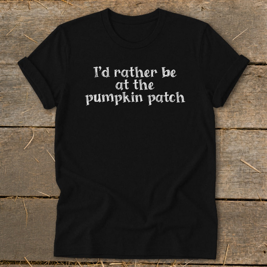Black t-shirt with white text "I'd rather be at the pumpkin patch".