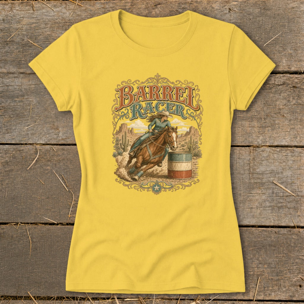 Yellow t-shirt with Barrel Racer graphic of a woman on a horse by a barrel.