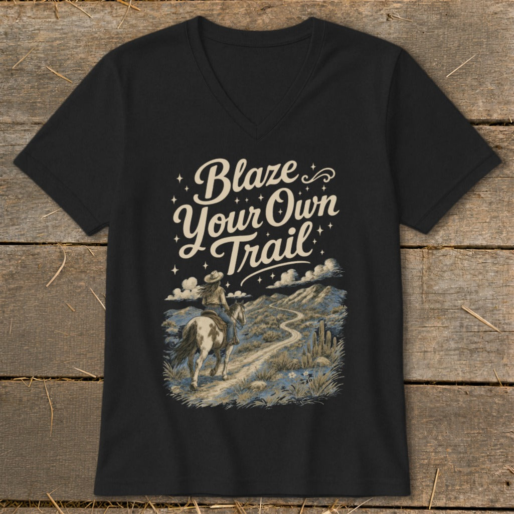 Black t-shirt with "Blaze Your Own Trail" text and a woman on horseback.