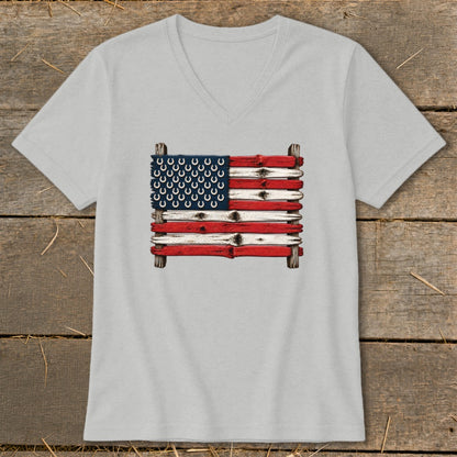 Light gray V-neck t-shirt featuring a rustic American flag design made of weathered wood planks and horseshoes.