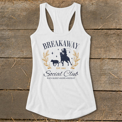 White tank top with "Breakaway Social Club" graphic and a cowboy on a horse roping a calf.