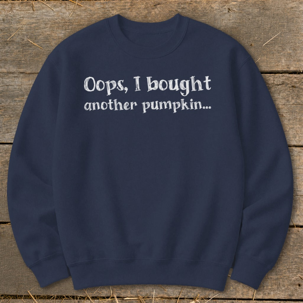 Navy sweatshirt with white text reading "Oops, I bought another pumpkin..."