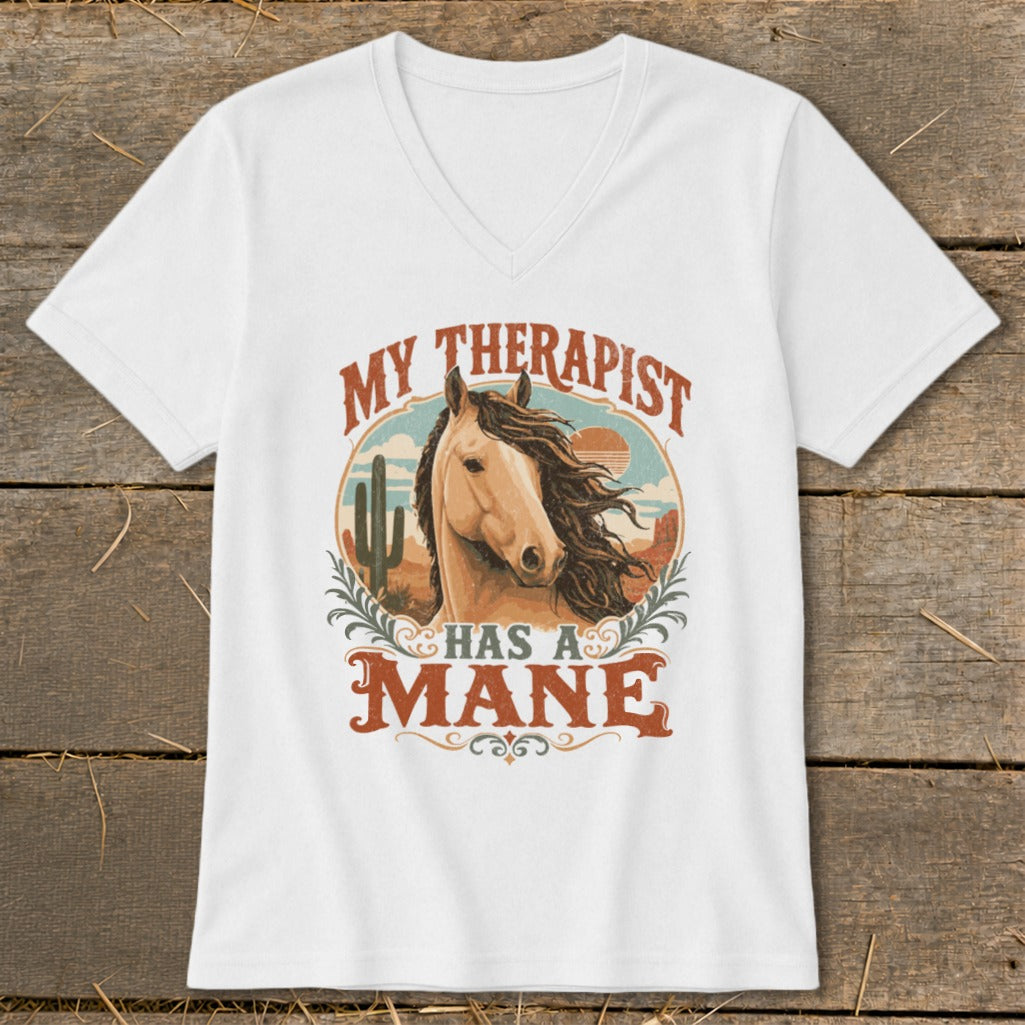 White v-neck t-shirt with "My therapist has a mane" text and horse graphic.