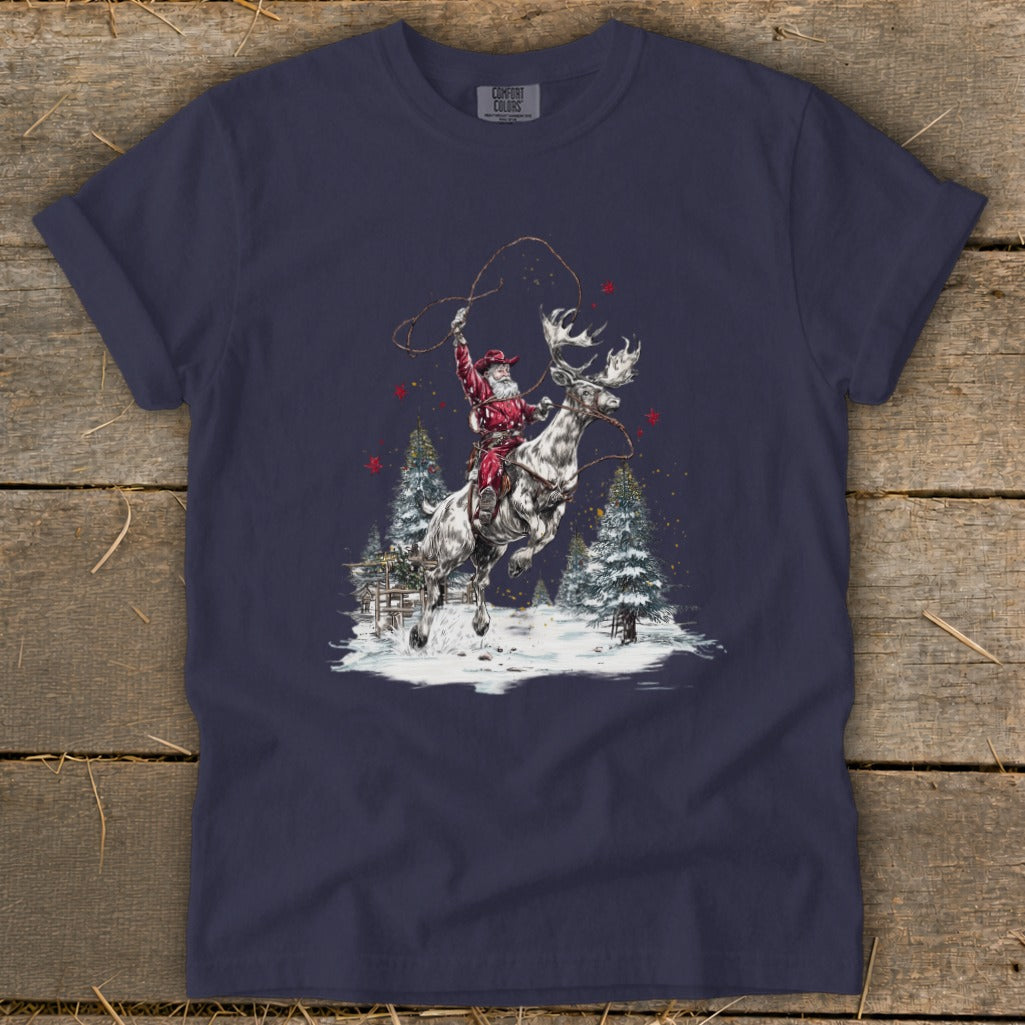 Santa riding a bucking reindeer with lasso, snowy trees, and stars.