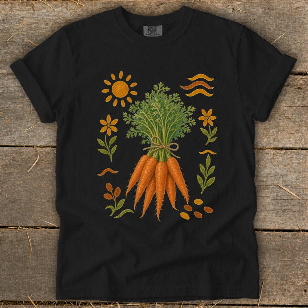Black t-shirt with illustration of carrots, sun, flowers, leaves, and wavy lines.
