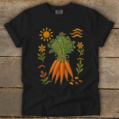 Black t-shirt with illustration of carrots, sun, flowers, leaves, and wavy lines.