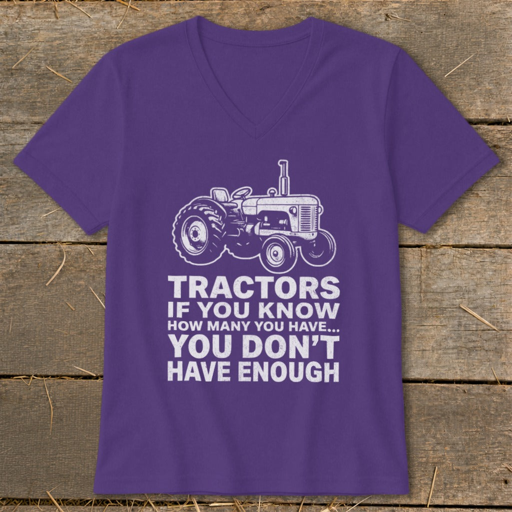 Purple t-shirt with white graphic of a tractor and text "Tractors if you know how many you have... You don't have enough".
