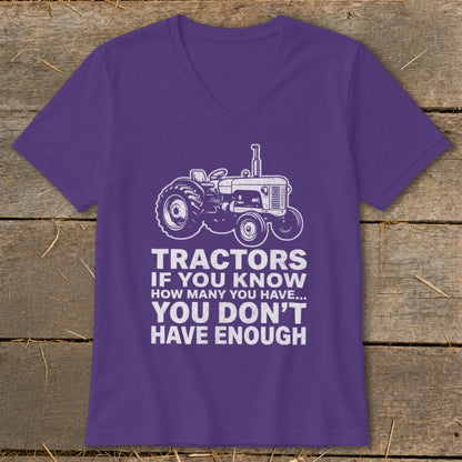 Purple t-shirt with white graphic of a tractor and text "Tractors if you know how many you have... You don't have enough".