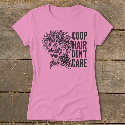 Pink t-shirt with black illustration of a crested chicken and text "COOP HAIR DON'T CARE".