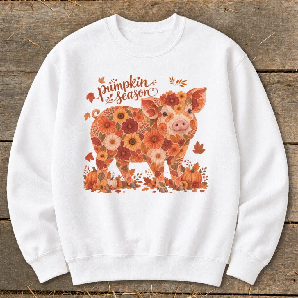 White sweatshirt with a floral pig graphic and "Pumpkin Season" text.