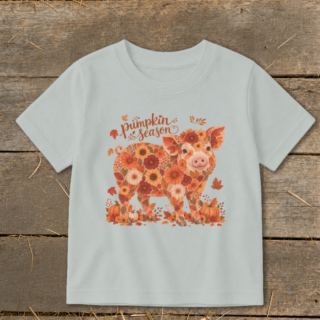 Light blue t-shirt with floral pig and "pumpkin season" text.