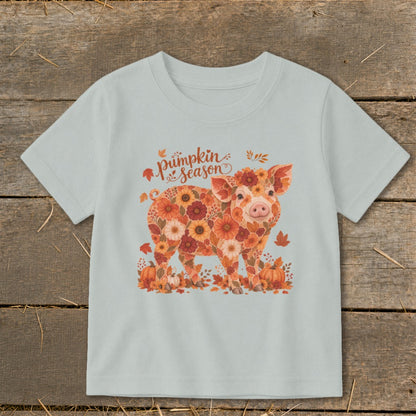 Light blue t-shirt with floral pig and "pumpkin season" text.