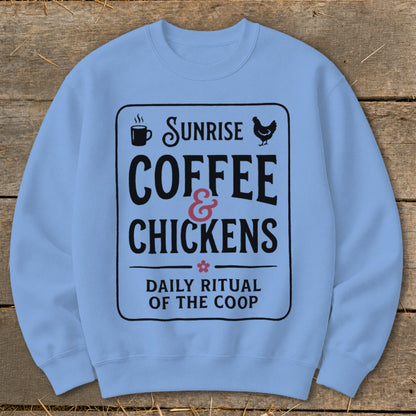Light blue sweatshirt with black text: "Sunrise Coffee & Chickens Daily Ritual of the Coop".