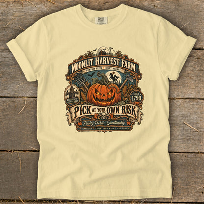 Moonlit Harvest Farm t-shirt with a jack-o'-lantern and "Pick At Your Own Risk" graphic.