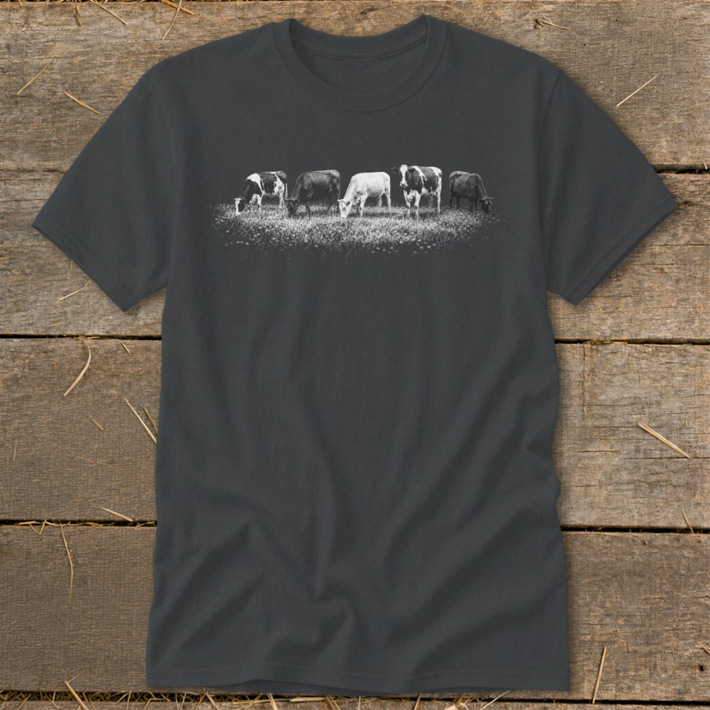 Dark grey t-shirt with a row of five cows grazing in a field.