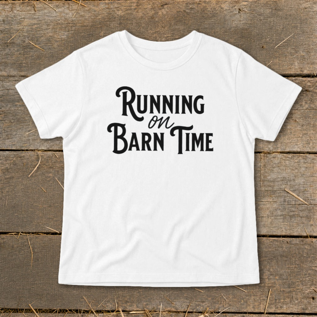 White t-shirt with black text "Running on Barn Time"