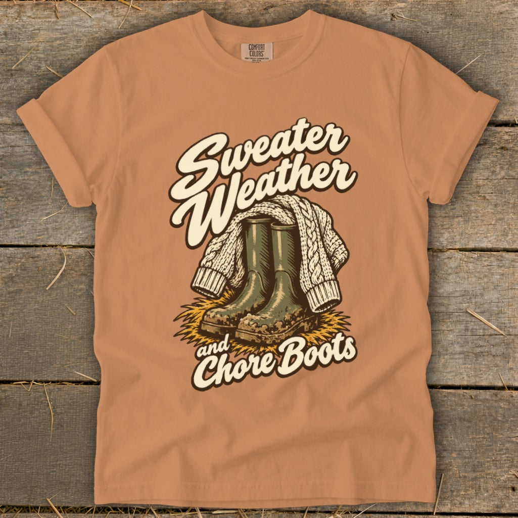 T-shirt with "Sweater Weather and Chore Boots" graphic featuring boots and knit sweater.