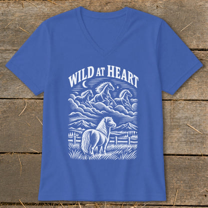 Blue t-shirt with white "WILD AT HEART" text and horse graphic.
