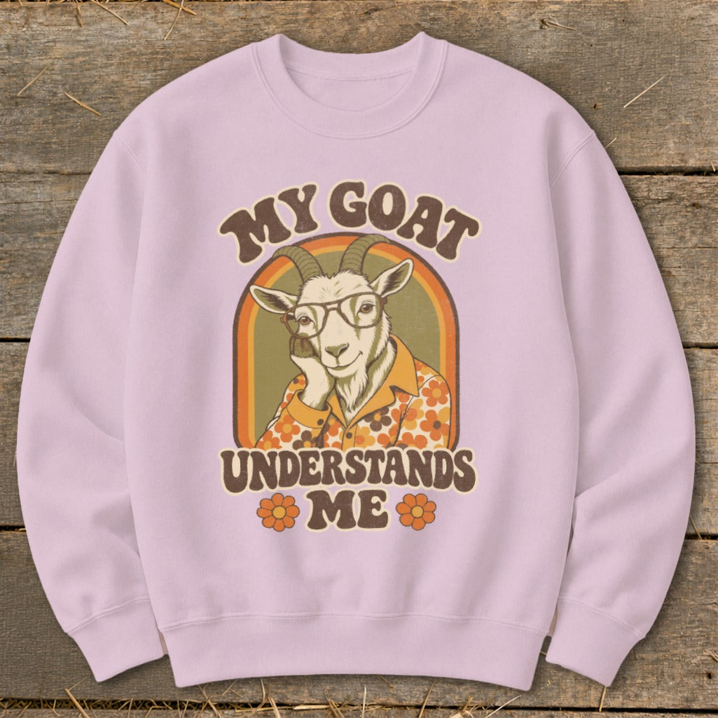 Pink sweatshirt with retro graphic of a goat wearing glasses and shirt saying "My Goat Understands Me".