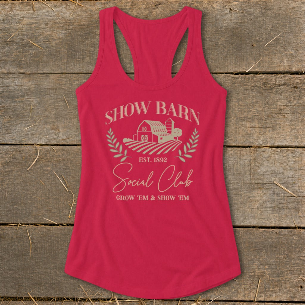 Pink tank top with "Show Barn Social Club Grow 'Em & Show 'Em" text.