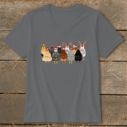 Group of chickens wearing Santa hats and Christmas lights.