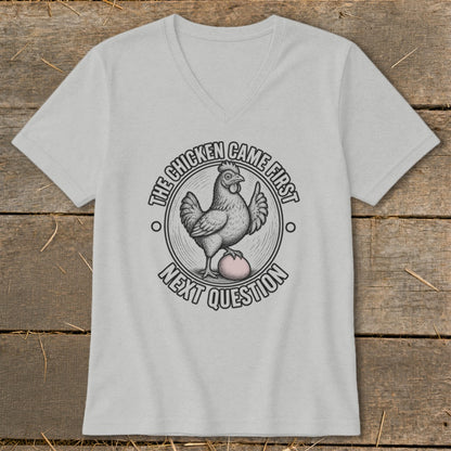 Gray t-shirt with a graphic of a chicken on an egg and text.