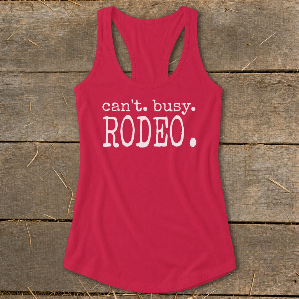 Red racerback tank top with white text that says "can't. busy. RODEO."