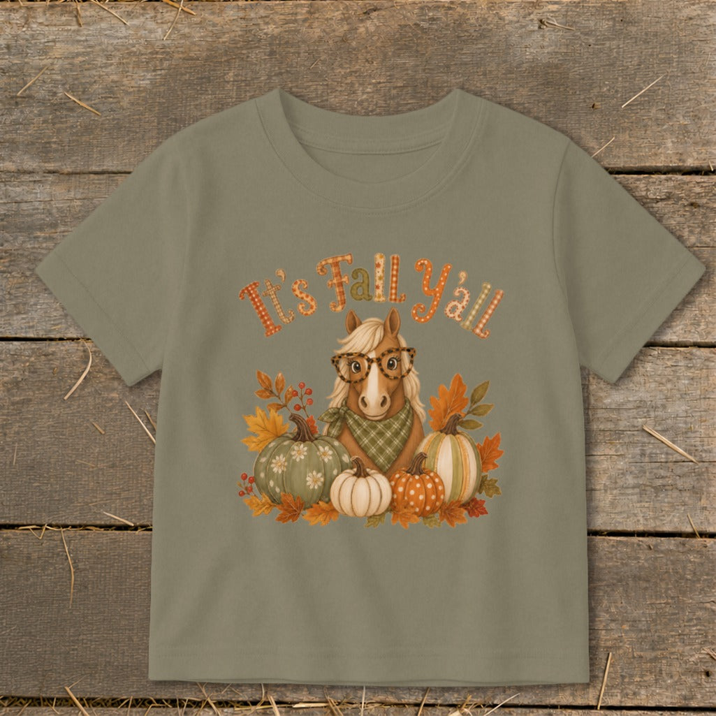 Kids' t-shirt with horse, pumpkins, leaves, and "It's Fall Y'all" text.