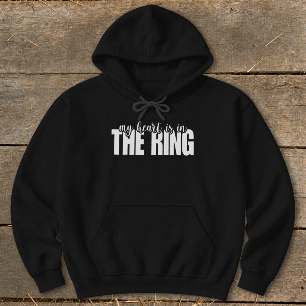 Black hoodie with white text "my heart is in THE RING" on the chest.