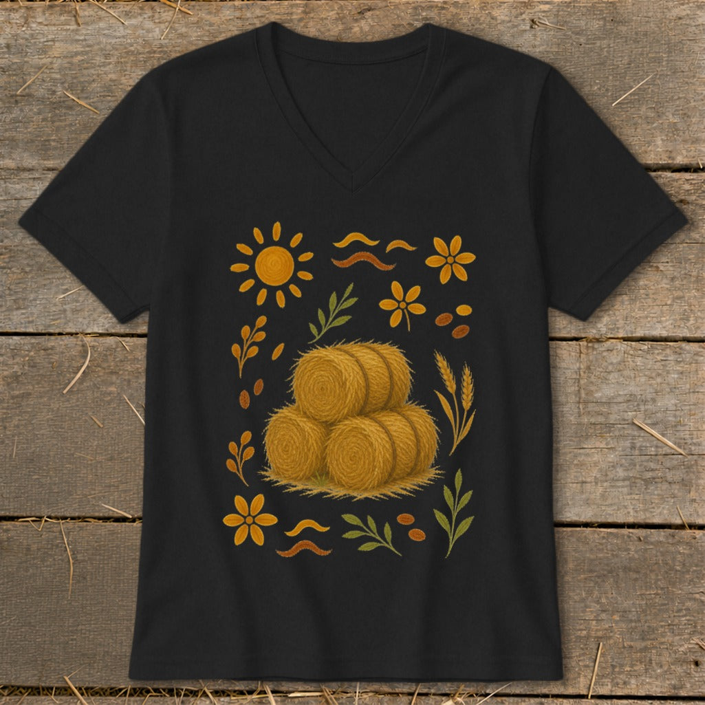 Black t-shirt with a stack of hay bales and fall harvest graphic elements.