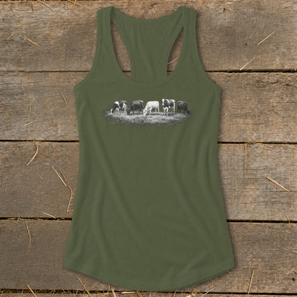 Green tank top with a graphic of five cows grazing in a field.
