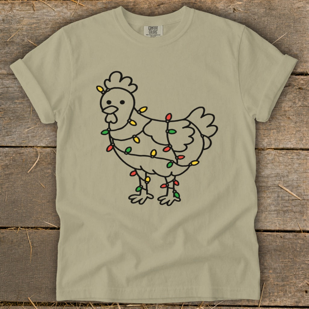Light-up chicken graphic on a tan t-shirt.