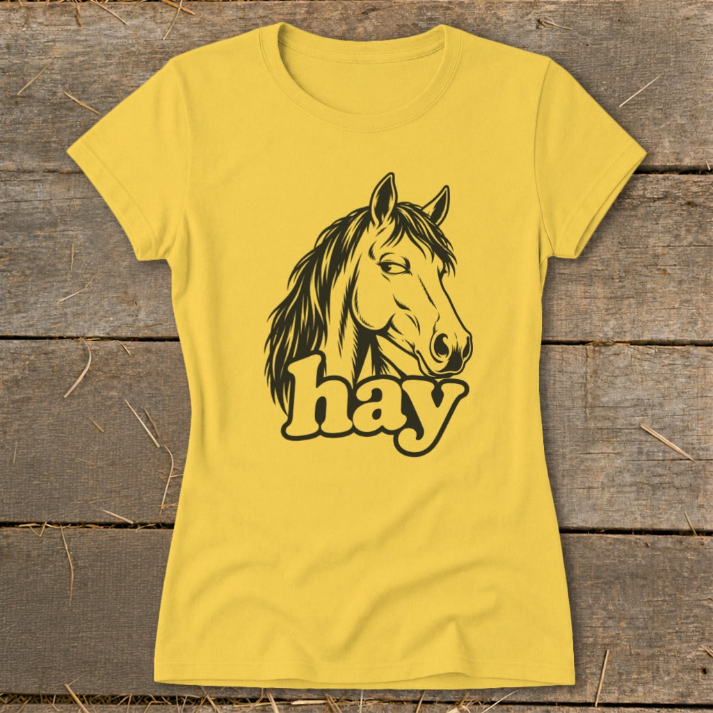 Yellow t-shirt with a black outline graphic of a horse's head and the word "hay".