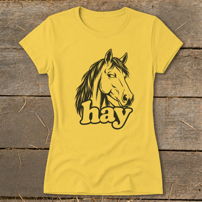 Yellow t-shirt with a black outline graphic of a horse's head and the word "hay".