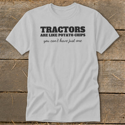 Grey t-shirt with black text: "Tractors are like potato chips you can't have just one."