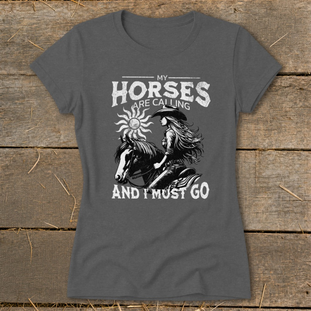 Dark grey t-shirt with "My Horses Are Calling And I Must Go" text and horse rider graphic.