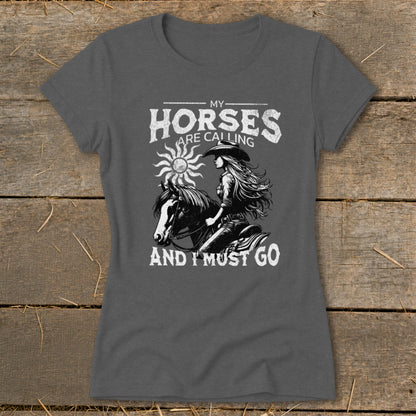 Dark grey t-shirt with "My Horses Are Calling And I Must Go" text and horse rider graphic.