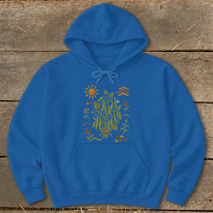 Blue hoodie with embroidered green beans, sun, and leaves design.