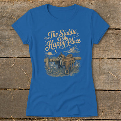 Blue t-shirt with "The Saddle Is My Happy Place" graphic and western saddle.